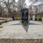 A wreath is placed at the New Jersey Gold Star Family Memorial at the New Jersey Vietnam Veterans Memorial in Holmdel, New Jersey, Dec. 10, 2025. Wreaths were placed at the base of each of the memorial’s 366 eight-foot-tall black granite panels – each representing a day of the year – listing the names of the 1,564 New Jersey men and one woman who gave their lives while serving in Southeast Asia. In addition, the Wreaths Across America convoy stopped at the memorial on their annual journey to Arlington National Cemetery. This year marks the 50th anniversary of the end of the Vietnam War. (New Jersey Department of Military and Veterans Affairs photo by Mark C. Olsen)