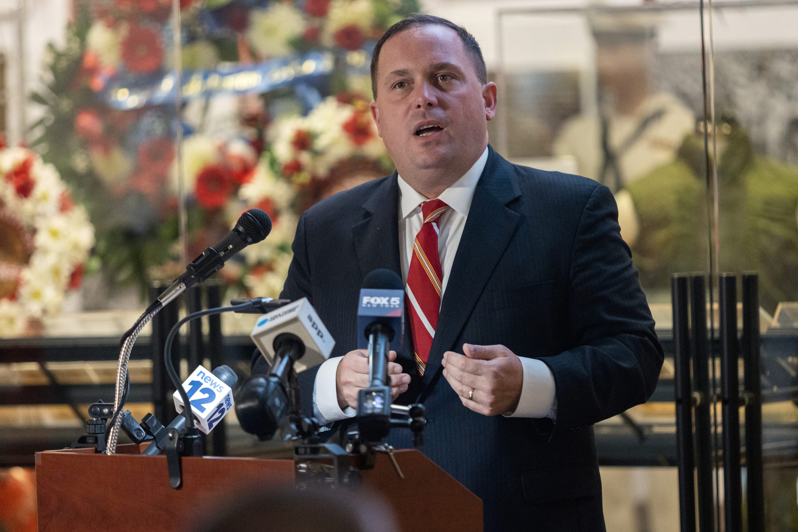 Vincent Solomeno III, Deputy Commissioner of Veterans Affairs, New Jersey Department of Military and Veterans Affairs, and Administrator of Veterans Affairs for the State of New Jersey, addresses the audience during the State Veterans Day ceremony at the New Jersey Vietnam Veterans’ Memorial, Vietnam Era Museum and Educational Center at Holmdel, New Jersey, Nov. 11, 2025. Veterans Day celebrates and honors America’s veterans for their patriotism, love of country, and willingness to serve and sacrifice for the common good. (New Jersey Department of Military and Veterans Affairs photo by Mark C. Olsen)