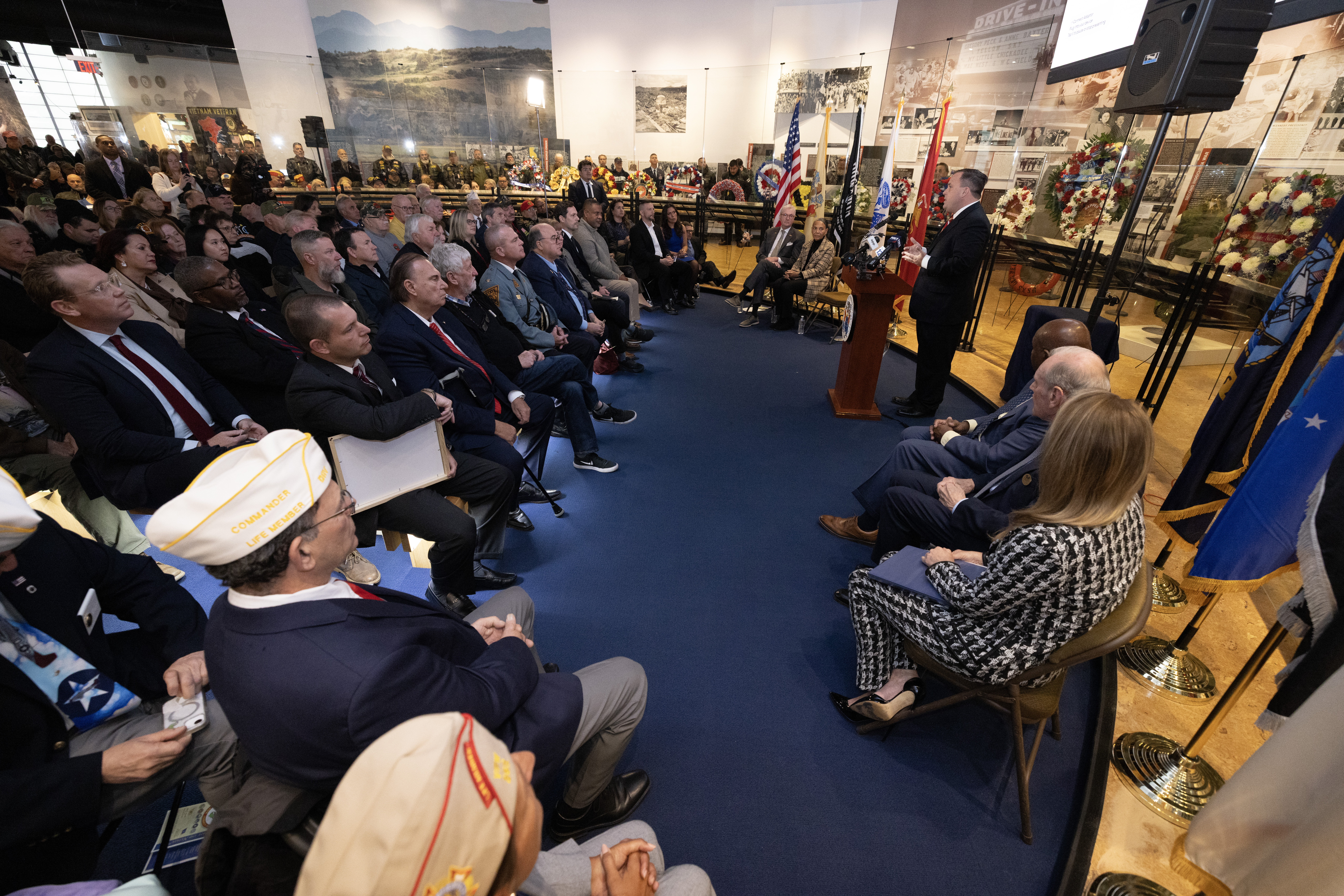 Vincent Solomeno III, Deputy Commissioner of Veterans Affairs, New Jersey Department of Military and Veterans Affairs, and Administrator of Veterans Affairs for the State of New Jersey, addresses the audience during the State Veterans Day ceremony at the New Jersey Vietnam Veterans’ Memorial, Vietnam Era Museum and Educational Center at Holmdel, New Jersey, Nov. 11, 2025. Veterans Day celebrates and honors America’s veterans for their patriotism, love of country, and willingness to serve and sacrifice for the common good. (New Jersey Department of Military and Veterans Affairs photo by Mark C. Olsen)