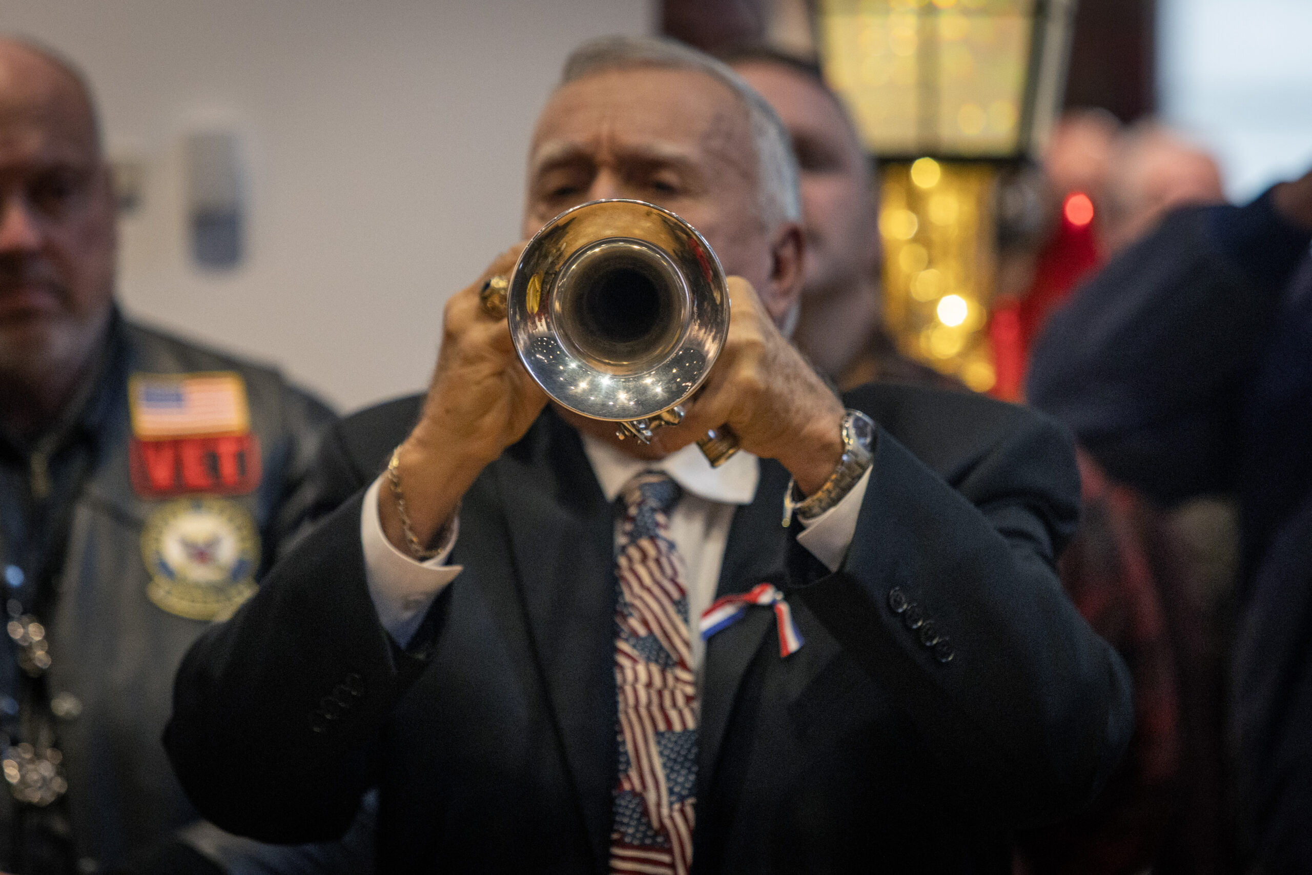 Frank Hughes plays Taps during the State Veterans Day ceremony at the New Jersey Vietnam Veterans’ Memorial, Vietnam Era Museum and Educational Center at Holmdel, New Jersey, Nov. 11, 2025. Veterans Day celebrates and honors America’s veterans for their patriotism, love of country, and willingness to serve and sacrifice for the common good. (New Jersey Department of Military and Veterans Affairs photo by Mark C. Olsen)