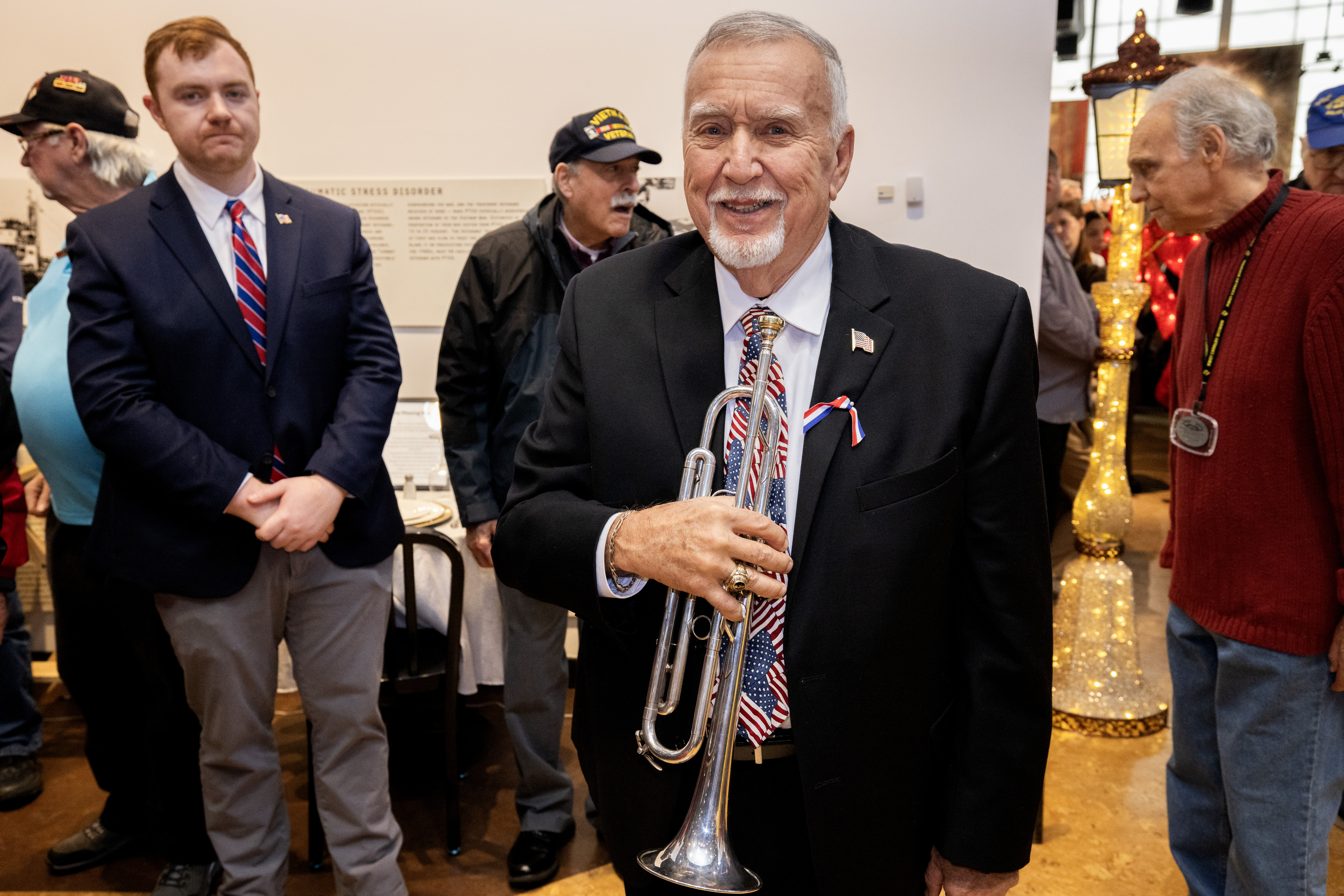 Frank Hughes plays Taps during the State Veterans Day ceremony at the New Jersey Vietnam Veterans’ Memorial, Vietnam Era Museum and Educational Center at Holmdel, New Jersey, Nov. 11, 2025. Veterans Day celebrates and honors America’s veterans for their patriotism, love of country, and willingness to serve and sacrifice for the common good. (New Jersey Department of Military and Veterans Affairs photo by Mark C. Olsen)