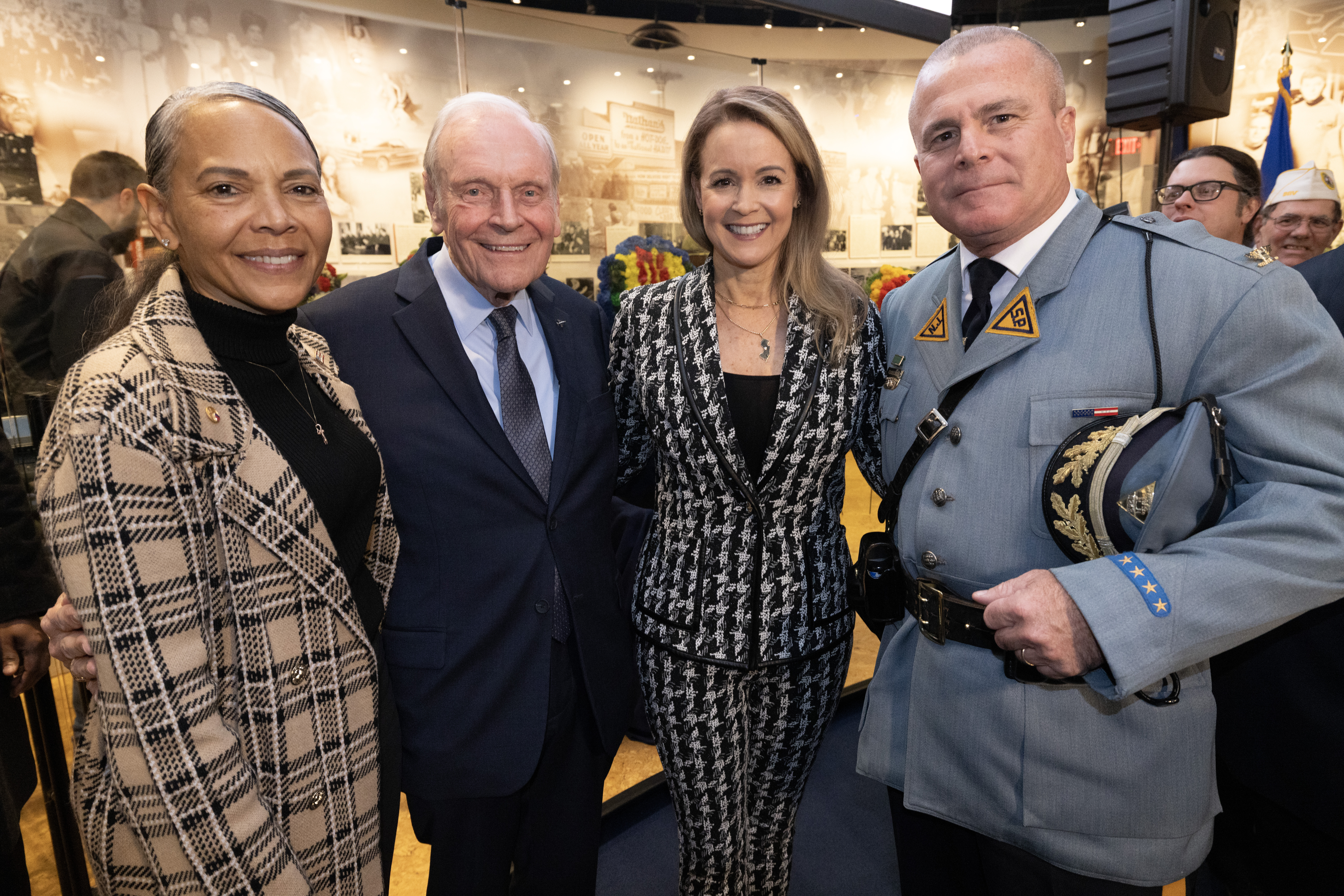 Brig. Gen. Yvonne L. Mays, The Adjutant General of New Jersey, left; Retired Maj. Gen. Clark W. Martin, Board Chairman, New Jersey Vietnam Veterans Memorial Foundation, second from left; Amy Osborn, CEO, NJVVMF, second from right, and Col. Patrick J. Callahan, Superintendent, New Jersey State Police, have their photo taken after the State Veterans Day ceremony at the New Jersey Vietnam Veterans’ Memorial, Vietnam Era Museum and Educational Center at Holmdel, New Jersey, Nov. 11, 2025. Veterans Day celebrates and honors America’s veterans for their patriotism, love of country, and willingness to serve and sacrifice for the common good. (New Jersey Department of Military and Veterans Affairs photo by Mark C. Olsen)